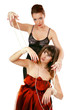 Two beautiful girls acting as wire-puller and marionette