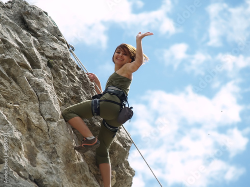 Girl climbing and greeting