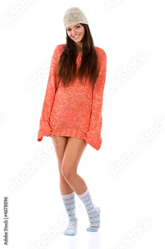 Cute brunette in a long wool sweater