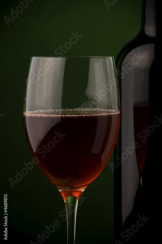red wine glass and bottle details
