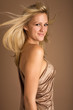 Vibrant Fashion Model in Gold Dress Vibrant Fashion Model in Gold Dress