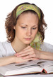Photo: Portrait of Beautiful girl with green headscarf reading book Portrait of Beautiful girl with green headscarf reading book