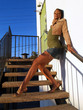 Tall woman on stairs