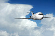 Airliner coming out of clouds