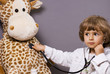 Foto: beautiful four years old playing with stethoscope beautiful four years old playing with stethoscope