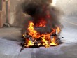 Fogo e Fumaça em rua na Cidade