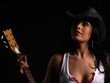Beautiful latino rock chick with an electric guitar
