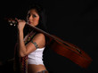 Latino rock chick with a guitar over her shoulder