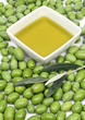 Extra virgin olive oil and green olives