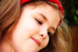 Photo: Little girl with an adoring look given a dream like effect Little girl with an adoring look given a dream like effect