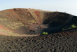 Tourists on the border of craters Silvestri of the Etna