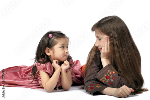 Photo: Two girls look friend on friend Two girls look friend on friend