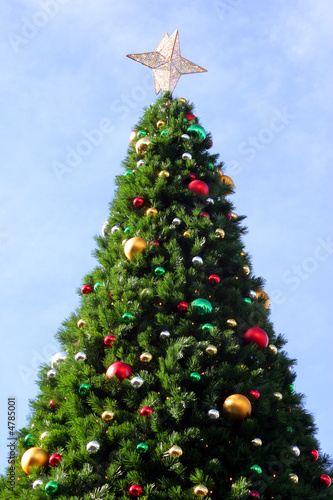 Photo: Christmas tree with ornaments and star Christmas tree with ornaments and star