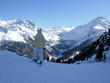 woman on skis and mountains
