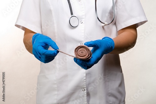 Photo: Apply bandage Apply bandage