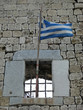 old window and greek flag old window and greek flag
