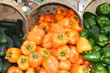 Green and orange peppers for sale