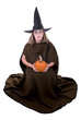 Witch woman with pumpkin