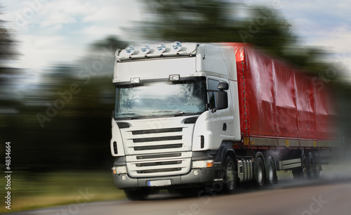 truck driving on country-road/motion truck driving on country-road/motion