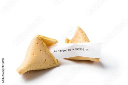 Photo: isolated broken fortune cookie w/ message isolated broken fortune cookie w/ message