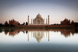 Taj Mahal reflected in river at twilight Taj Mahal reflected in river at twilight