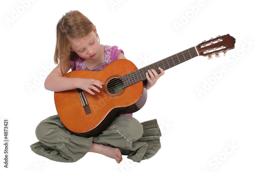 Photo: Young girl with guitar Young girl with guitar
