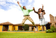happy couple jumping