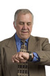 older businessman checking time
