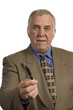 older businessman offering pen to client