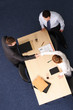 business man and woman formal handshake over table