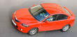 red car isolated on gray asphalt of my 