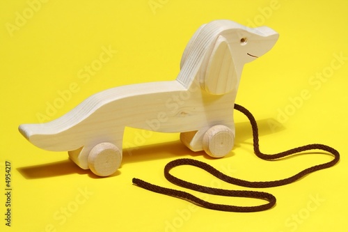 Photo: Wooden toys on colorful background Wooden toys on colorful background