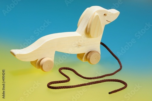 Photo: Wooden toys on colorful background Wooden toys on colorful background