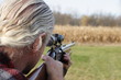 Hunter aiming a shotgun