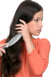 pretty woman combing her hair