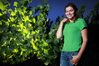 Young woman standing text to grapevine