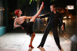 Couple dancing on a street at night. Couple dancing on a street at night.