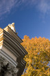 Statues against golden tree