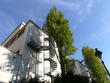 Double spirale, escalier et son ombre s=ur une façade, Paris Double spirale, escalier et son ombre s=ur une façade, Paris