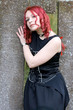 Gothic girl on a cemetery in sorrow Gothic girl on a cemetery in sorrow