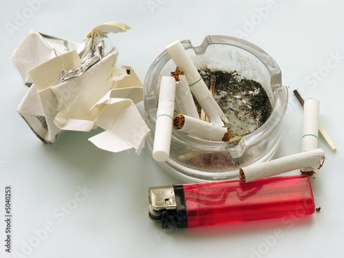 Photo: cigarettes,ash-tray and lighter cigarettes,ash-tray and lighter