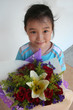 Photo: Girl holding bouquet Girl holding bouquet