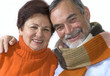 Happy elderly couple embracing 