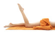 long legs of relaxed lady with orange towel #2