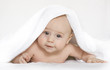 Little baby under white towel