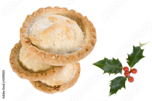 Photo: Stack of mince pies with holly for Christmas Stack of mince pies with holly for Christmas