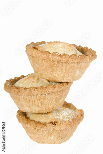 Photo: Stack of mince pies for Christmas on white background Stack of mince pies for Christmas on white background