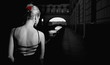Black and white picture of a girl in old city