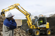 bulldozer, digger and engineers