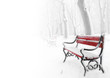 Red benches in the fog in winter